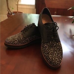 Clarks leather saddle Oxford with faux pony skin toe.